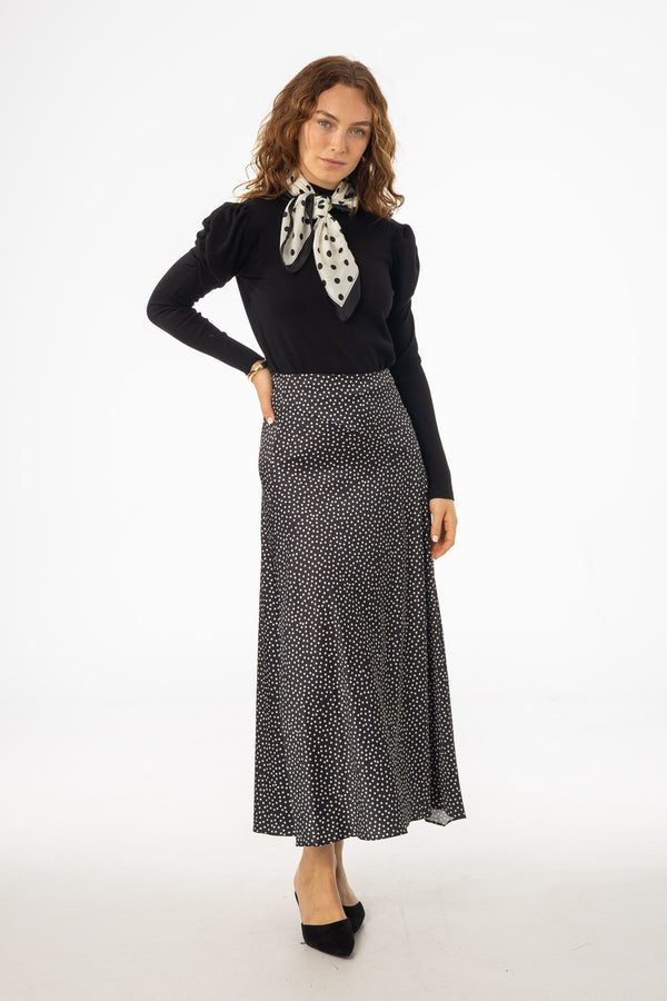 Black Polka Dot Asymmetrical Flare Skirt with Feminine Draping and Modern High Waistline